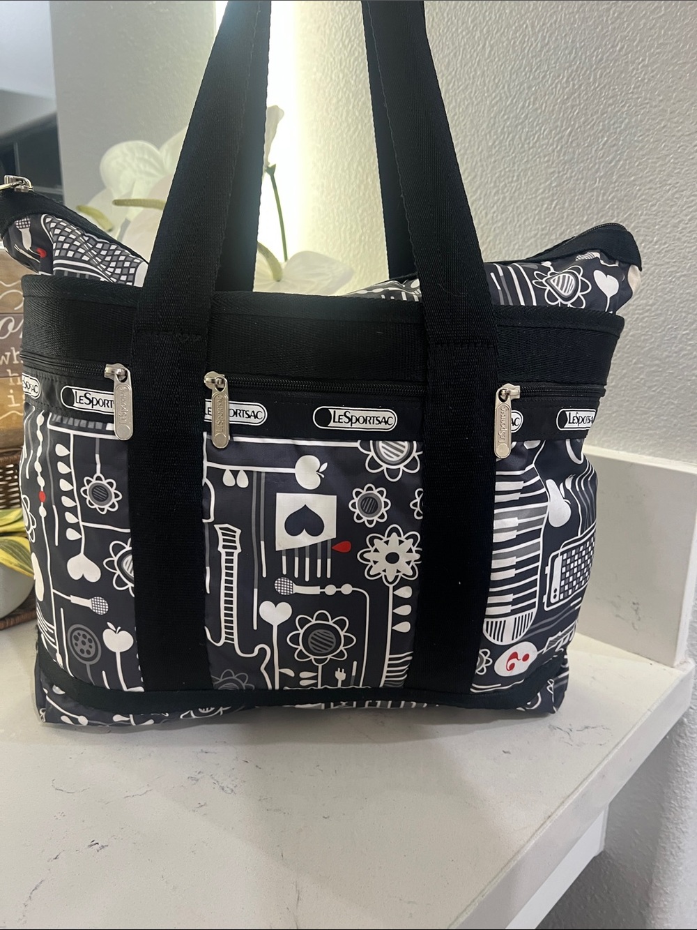 LeSportsac Black and White Graphic Zip Tote with Red Accent